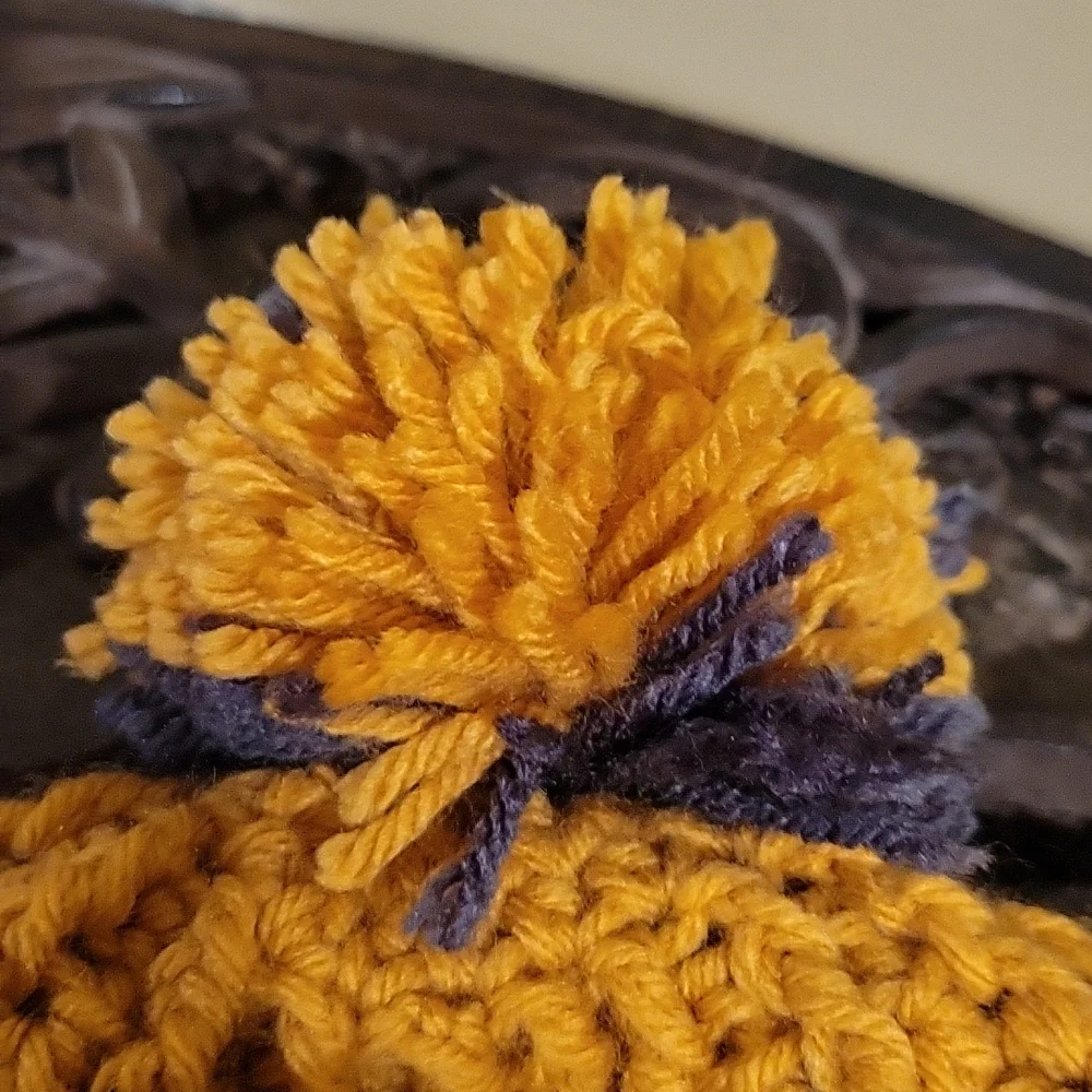 Handmade pom-pom hat beanie with fleece lining at ears crochet